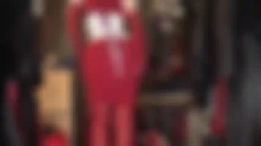 Lady in red - body worship of mistress' wonderful curves in a tight red knit dress, leather overknees boots and matching gloves.