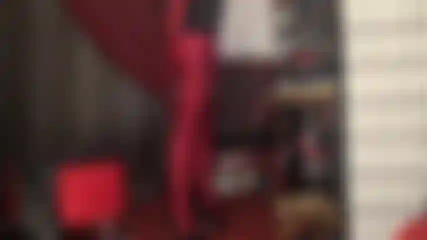 Like spandex tights? This dark red pair of shiny lycra pantyhose will have you stroking hard.