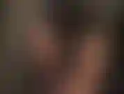 Tight pants worship in black satin jeans and shiny blue leggings.