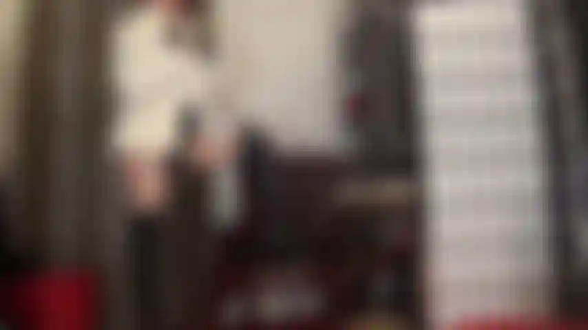 Strapon mistress in black leather, glossy pantyhose and white fur coat - leather and fur goddess jacks off her big black cock holding a pen like a cigarette and teasing with her beautiful leather skirt and long boots.