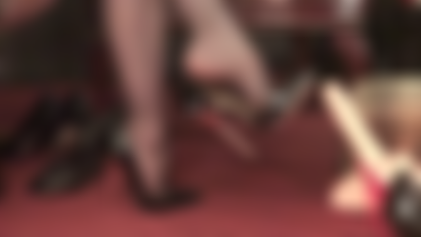 Shoe play and dangling with black high stiletto pumps