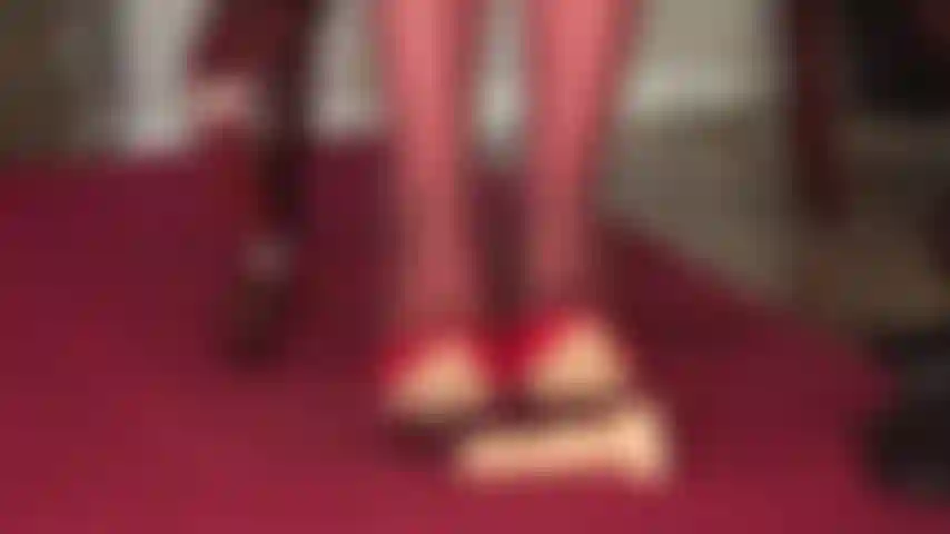 Shiny red patent pumps, pantyhose feet and riding crop to torment your slave cock.