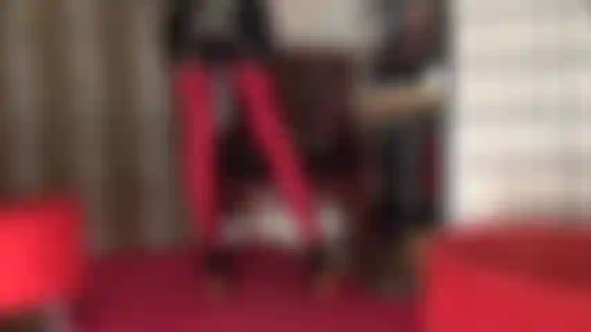 Body worship in red wet look lycra/spandex tights and black shiny pvc outfit. Legs to kill in a very special pair of glossy dark red high denier pantyhose, ankle boots and vinyl fetish indulgence.