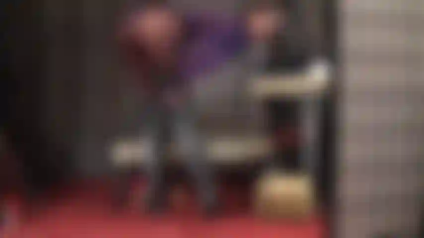 Jerk off encouragement for Mistress' fine curves in dark brown opaque pantyhose with leather gloves and boots.