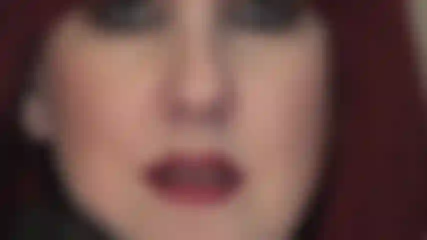 200710-0012-Glossy-red-lips-face-closeup.