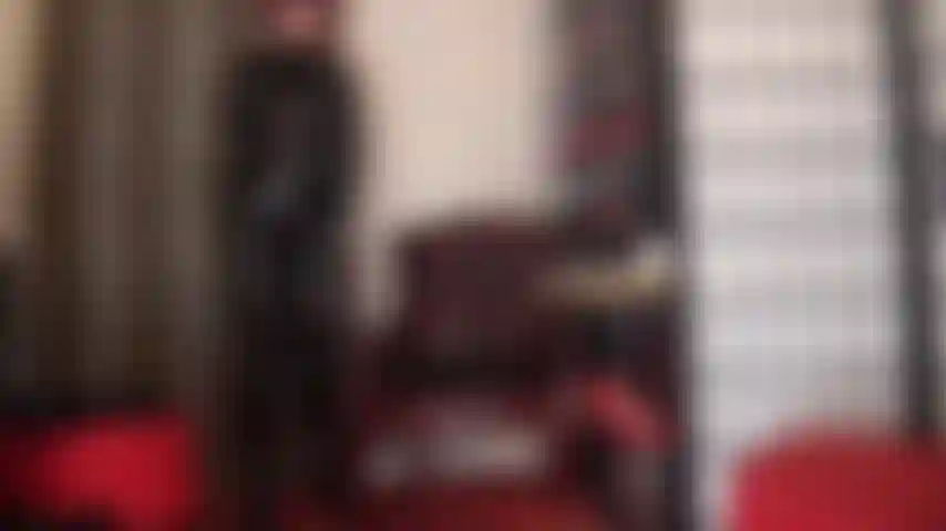 Pvc fetish - admire mistress vivian's shiny curves in this black vinyl catsuit with overknees boots and leather gloves.