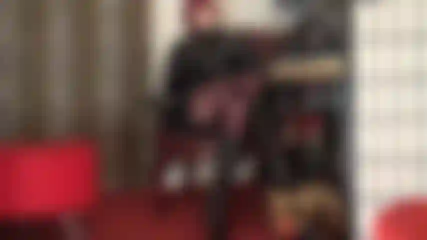 The pvc outfit is extra glossy, but you only have eyes for mistress' dark brown opaque tights.