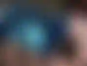 Tight blue latex dress.