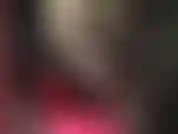 Sensual tease in stockings layered over pantyhose, shiny high heels and a skimpy latex mini skirt, leather corset and blonde wig. Sexy leg tease, ass worship, crossed legs...