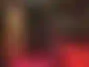 Encouraging you to jerk off to my crossed legs in black satin pants and tall shiny boots.