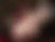 Mistress teases the silky nylon and satin fetishist with white lace top stockings, gloves, corset and her smallest strap-on.