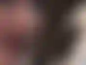 High heel tongue tease drives you wild - mistress vivian with short hair and black latex gloves holds a sexy white steel heel stiletto pump, teasing the long heel with her tongue.