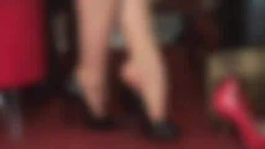 High heel perfection and foot worship - mistress vivian dangles shiny black peeptoe pumps from her beautiful toes in tan rt pantyhose.