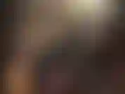 Satin pants, lycra bodysuit, black wig and leather hat to pair with a huge white strapon cock - your mistress in all black with a massive white cock for you to be fucked with.