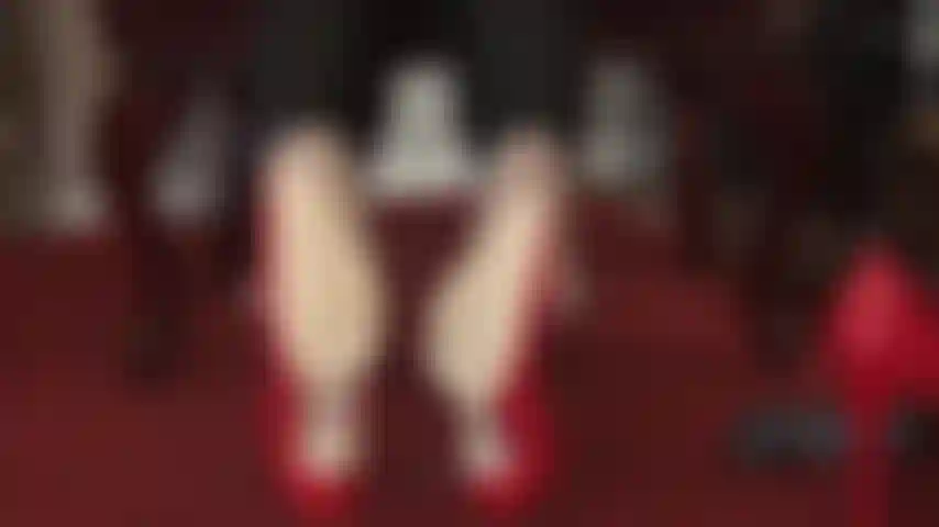 Double dangling fetish - shoe play fun with red steel heel stiletto pumps.