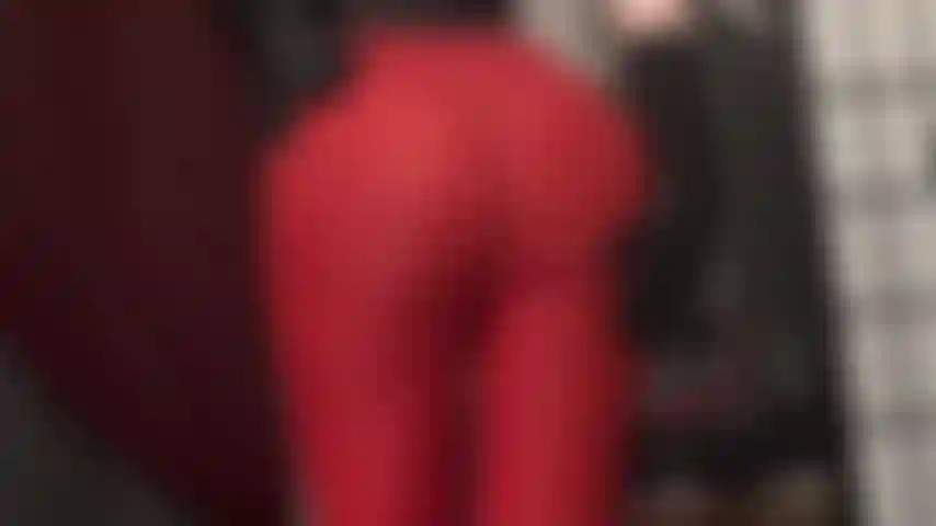These tight red leggings are so hot on mistress vivian's round butt, caressed by black leather gloves.