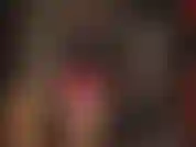 Latex layers - transparent stockings, a red hot mini dress, black gloves and black button shirt. Hotttt!