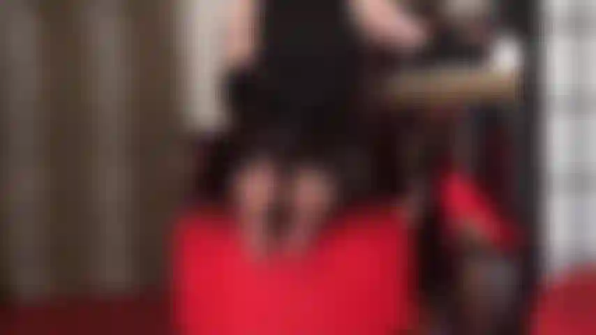 Foot fetish - feet are twirling, toes are wiggling and spreading in very sheer black pantyhose.