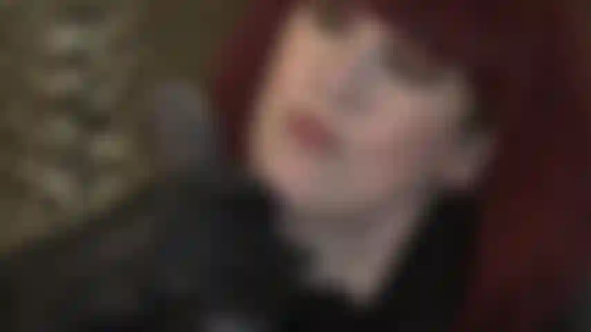 Leather goddess strokes big black cock with gloves.