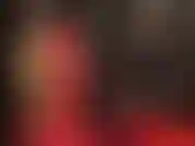 Mistress in red and black latex. The skirt is getting shorter, then changed to a skimpy black mini, followed by white nylon lace top stockings over latex. So hot!