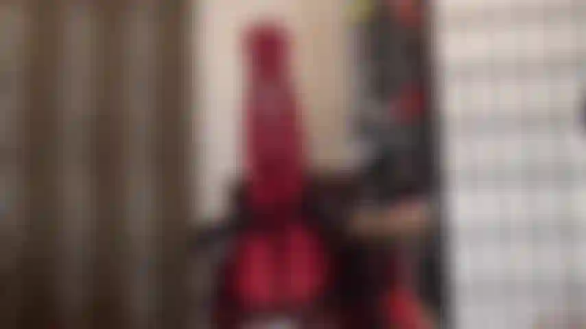 Legs up high in red glossy lycra pantyhose and footjob on uncut dildo.