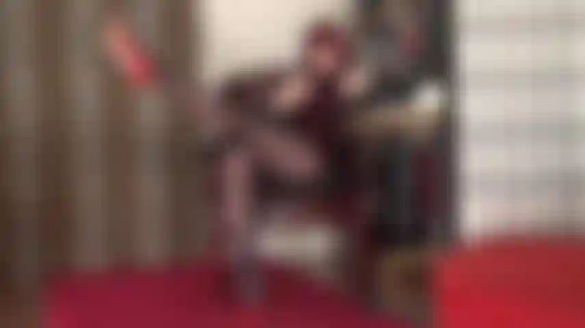 Long extended pantyhose legs, shoe play and dangling red stilettos, foot fetish.