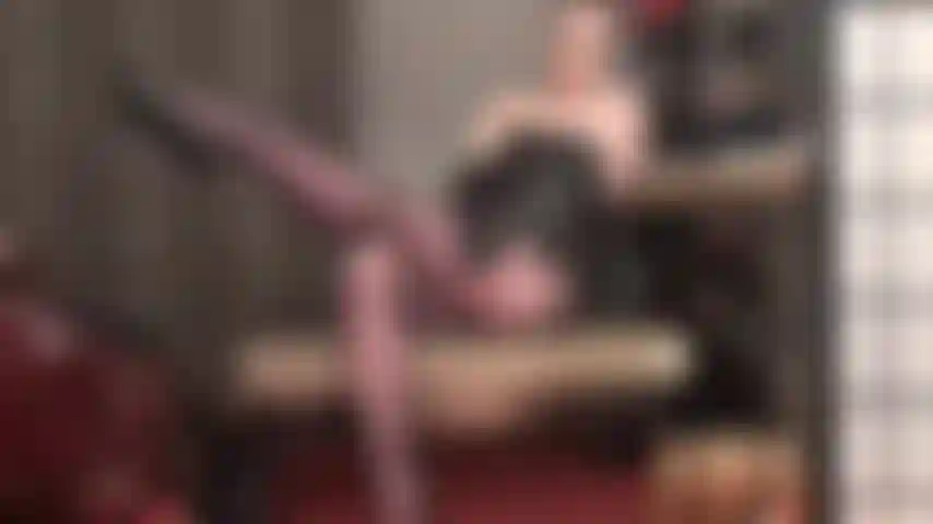 Mistress vivian is incredibly seductive in pantyhose, leather corset and gloves.