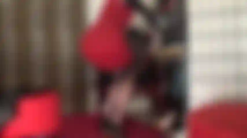 Handjob in silky stockings and stilettos.