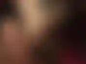 Resting my pantyhose feet on a footstool, massaged with black latex gloves. Mmmm.