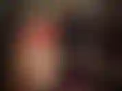 Red shiny satin shorts part 1/2 - combined with different pairs of lace top nylon stockings and boots - white stockings with tall shiny boots and leather knee boots, black seamed stockings with heels.