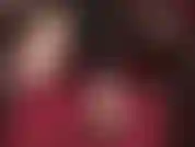 Bare foot dangling ballet flats.