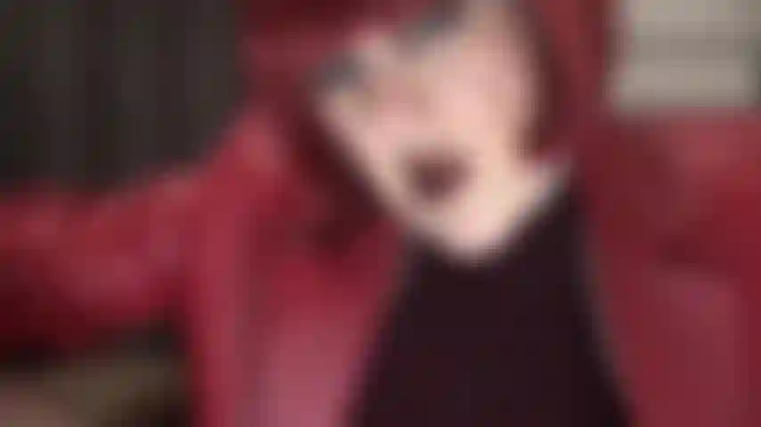 Red leather, dark brown lipstick and spitting upclose - you would do anything to drink all of mistress' tasty saliva.