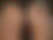 Sexy lace panties over glossy pantyhose.