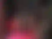 An enticing view on mistress' pantyhose legs in leather pencil skirt with back slit.