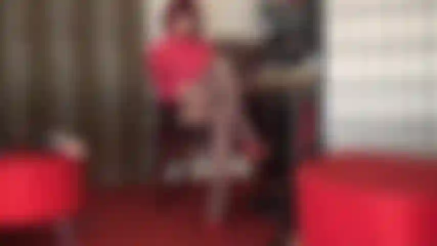 Mistress has your stocking covered slave dick trapped in the gap between her crossed pantyhose thighs.