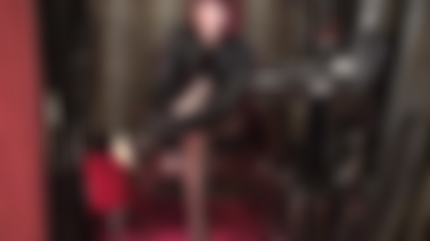 Indulge in a slow sensual tease with slow moving hypnotizing high heels, black pantyhose and shiny pvc gloves.