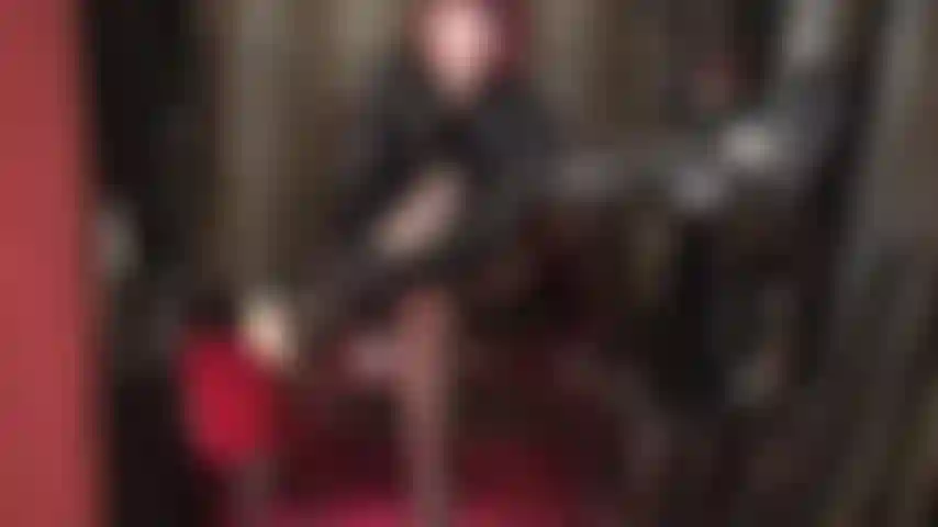 Indulge in a slow sensual tease with slow moving hypnotizing high heels, black pantyhose and shiny pvc gloves.