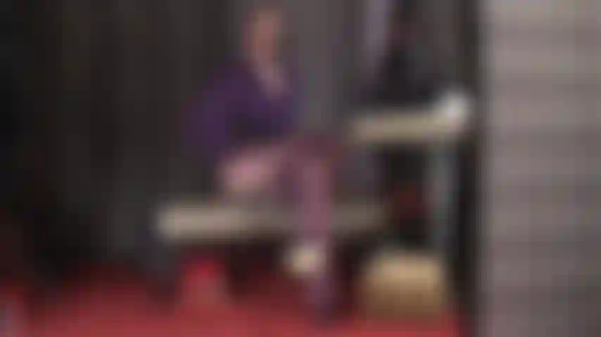 Double crossed legs - so perfect in purple opaque tights.