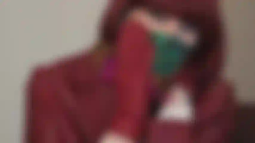 Silk scarf mask fetish - a soft silk scarf can be very effective used as a mask or gag. Mistress is dressed in red leather using a colorful silk scarf to cover the mouth.