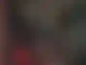 Latex correctional officer - mistress wears black and smoke green latex, polishing her latex skirt to a high gloss, adding a military rubber hat and riding crop. Mmmhmmm.