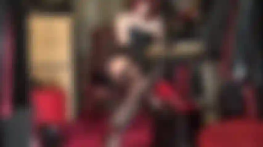 Femdom seduction in beautiful lingerie - leather corset and gloves, super shiny pantyhose, stockings and garters.