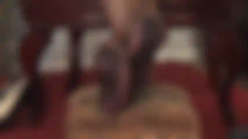 Foot worship in a very special pair of seamed tights with beautifully designed soles.