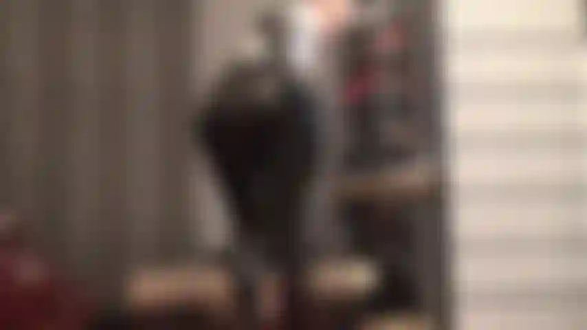 Admire mistress' shiny butt and long legs in glossy tight black fetish leggings.