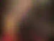 Sexy rubber outfit, pantyhose and tall platform boots.