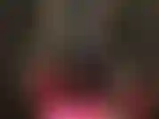 Stroking my big white strap-on as you drool over my body in tight shiny pvc catsuit.