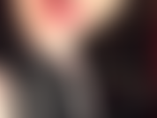 Latex Cleavage Tease - Mistress teases and tempts with sexy cleavage lowering the zipper of her tight shiny black latex outfit.