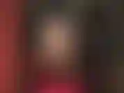 Mistress vivian, dressed in shiny black pvc, cracks her whip.