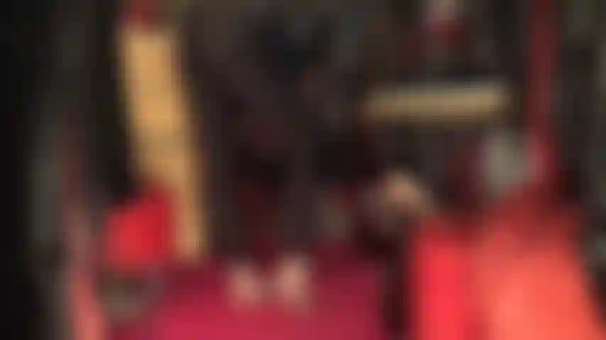 Black lycra spandex leggings and pantyhose feet (no shoes).