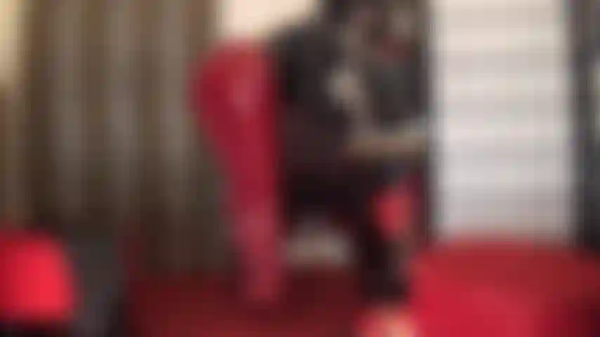 Red leather fetish - handjob in red leather pants and boots.