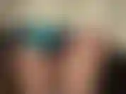 Shiny satin, glossy tights and fur fetish - watch your goddess tease with her wonderful ass in glossy pantyhose and shiny teal satin shorts, then take on a luxurious soft white fur coat.